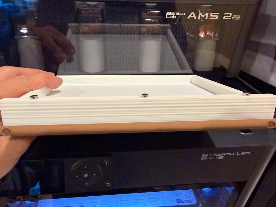 One tip about the magnets is that you need to check their polarity. I've only printed one side of the book and was able to insert them during the pause. The next step is that I'll put the opposite magnets on that printed part and wait for the second cover to pause and mate up the books to put the magnets in with their correct opposite polarity.