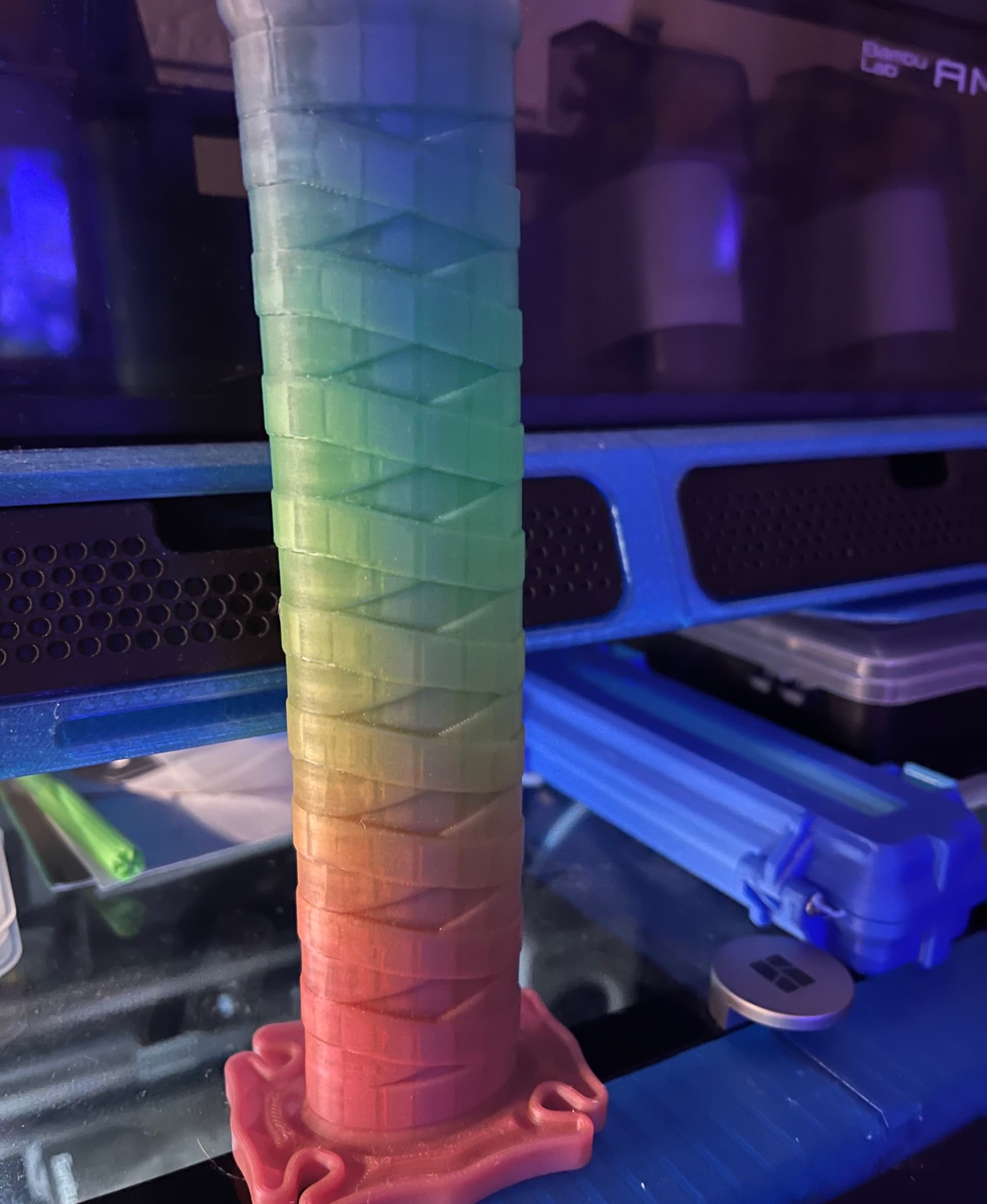 printed in a Yousu glow in the dark rainbow. my son loves it!