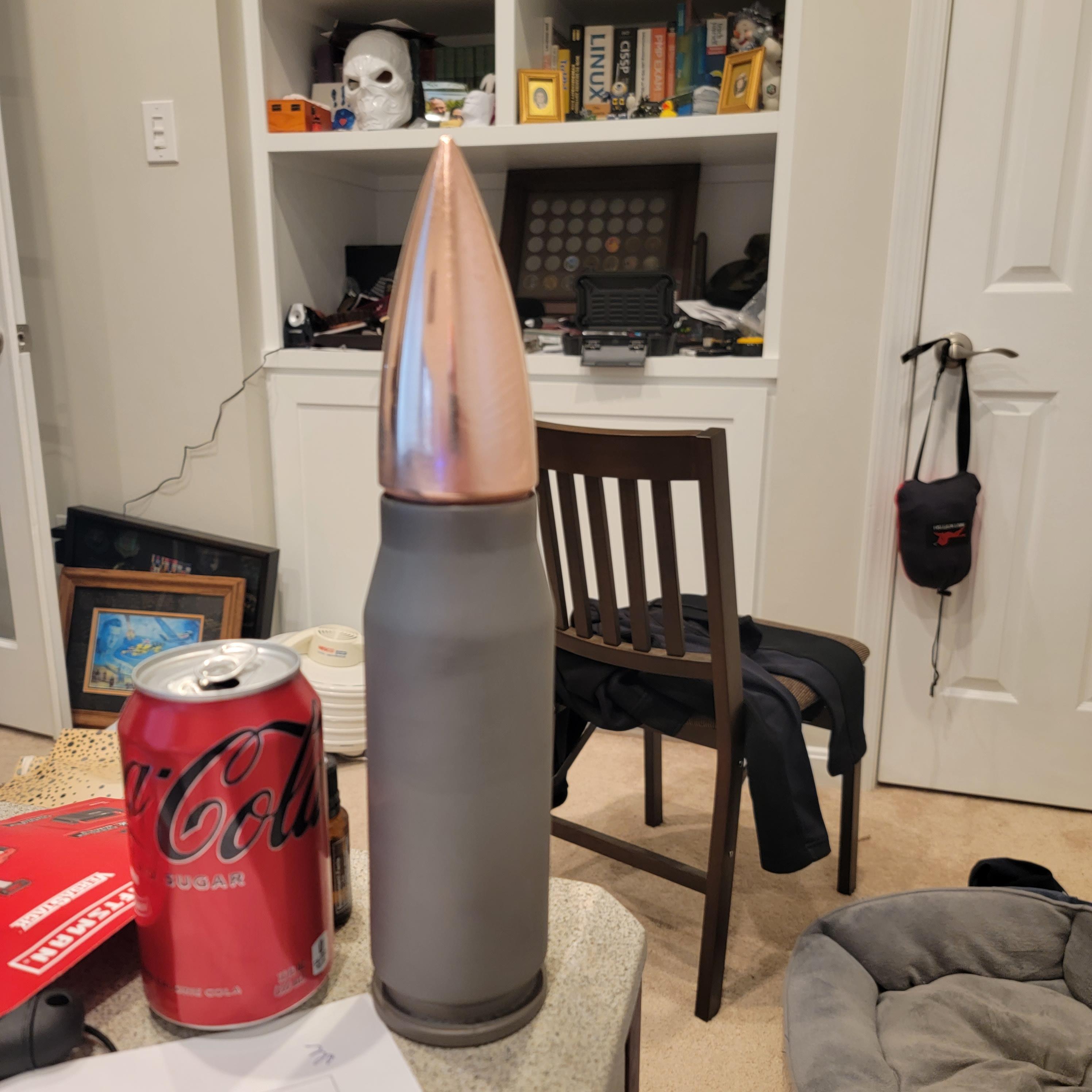 Bullet Container - Printed with an ender 3 pro, then painted in a nickel spray paint.  Finished with a copper electroplating for the bullet.  I got a couple of thin spots on the electroplating, but overall...it think it came out cool. - 3d model