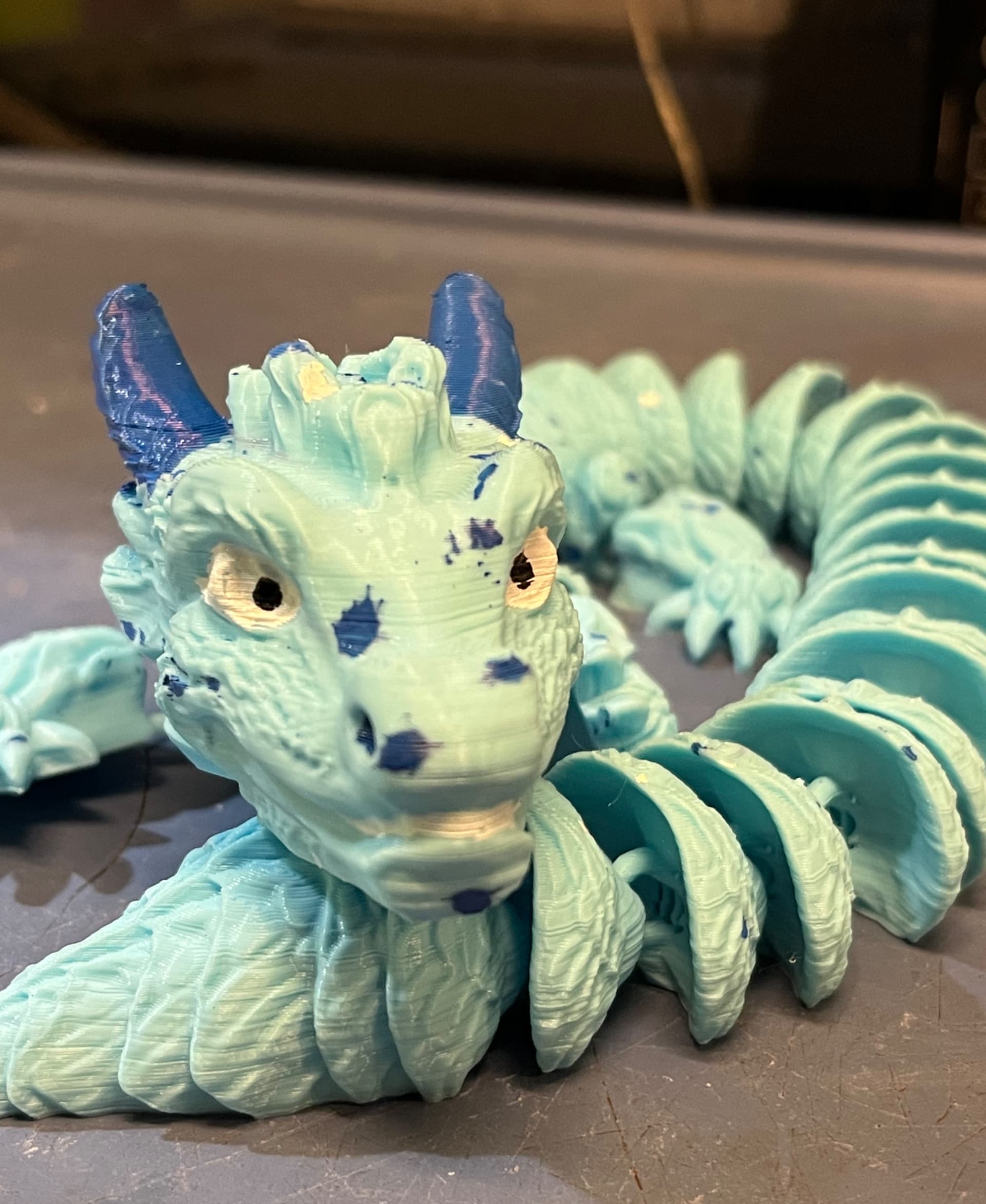 Chip wood dragon painted