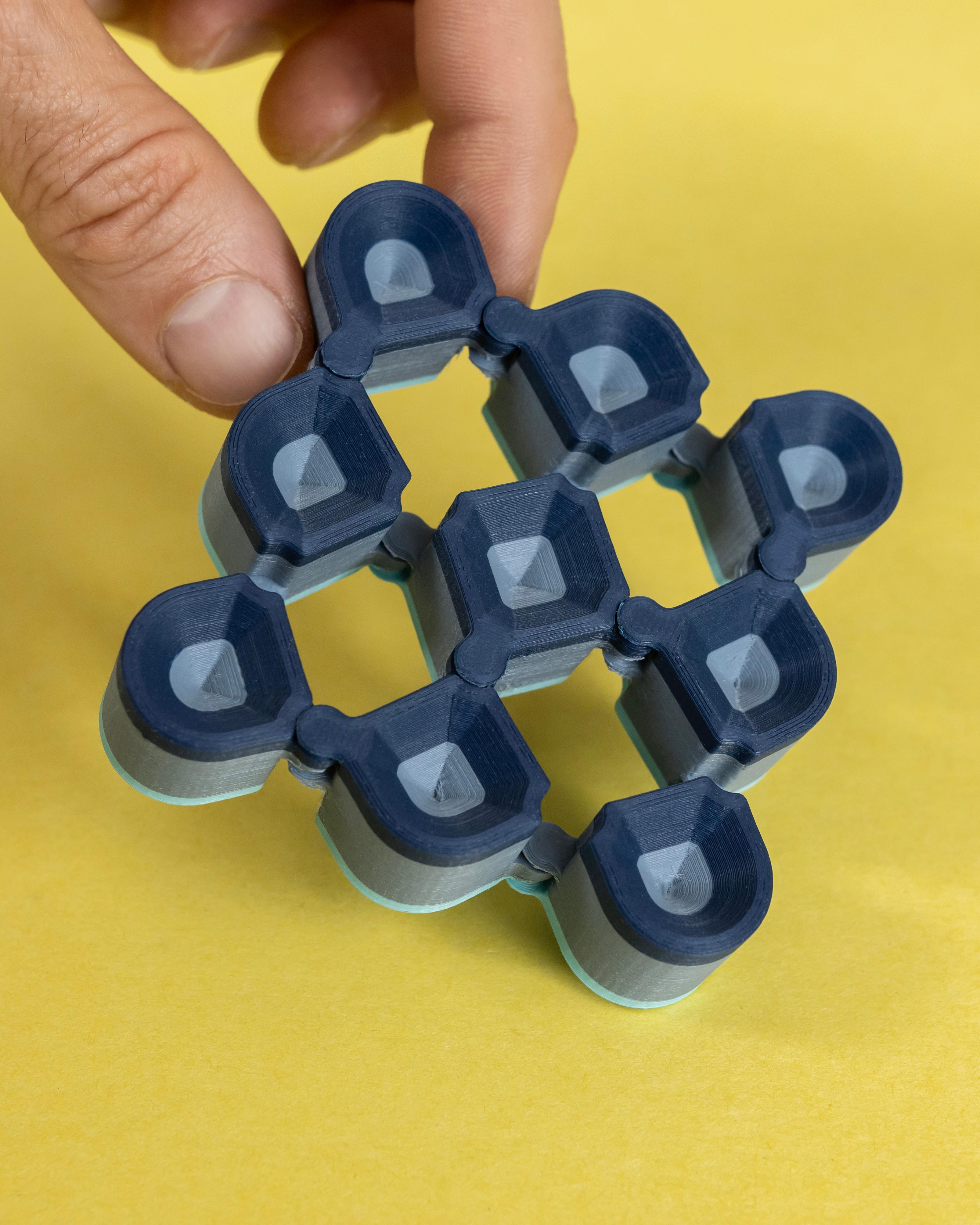 Auxetic Cubes // 18mm 3x3 SuperRound Tapered 3d model