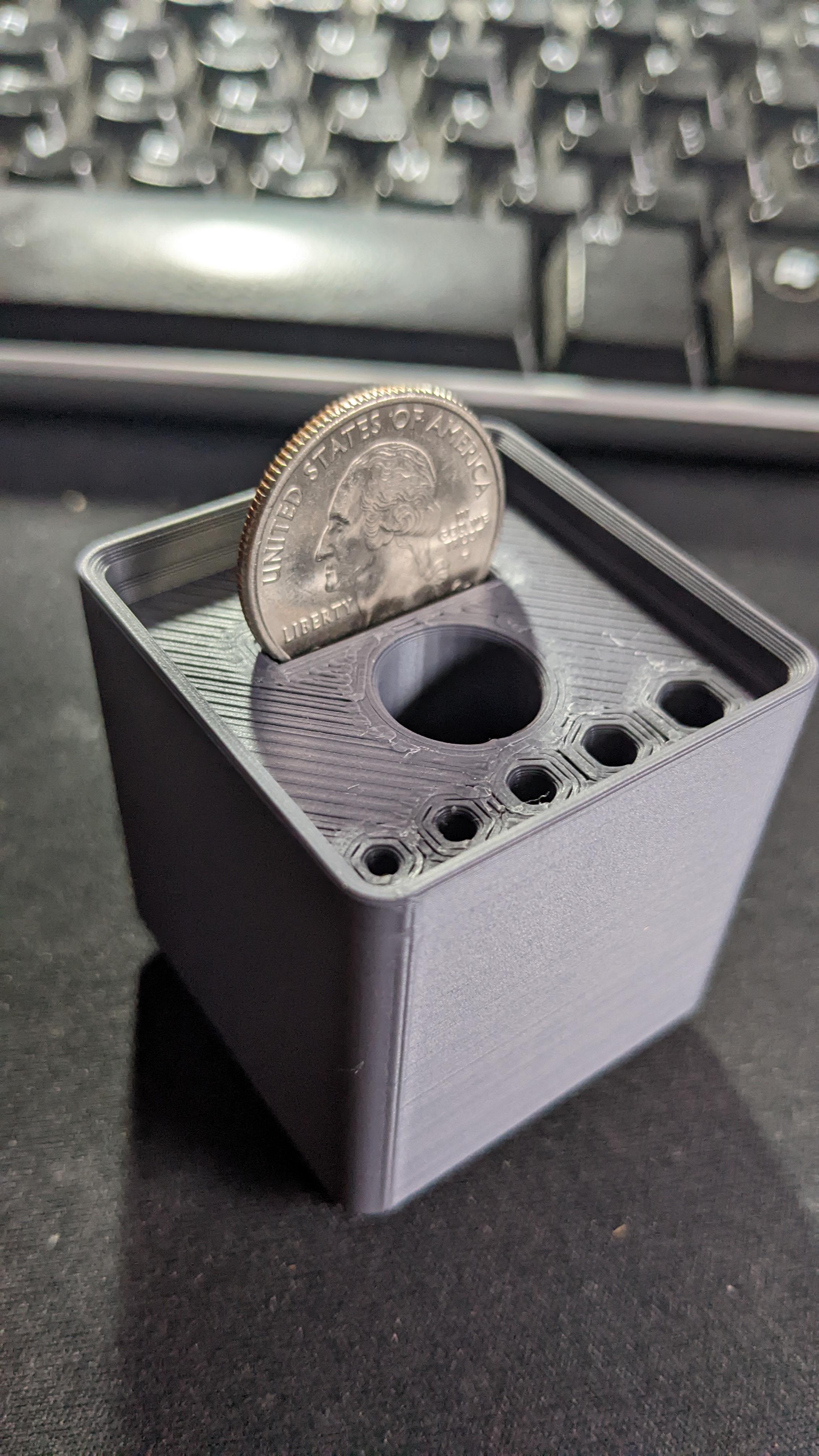 Gridfinity 1x1x6 Ender 3 Tool Holder - Obviously quarter for scale.   - 3d model