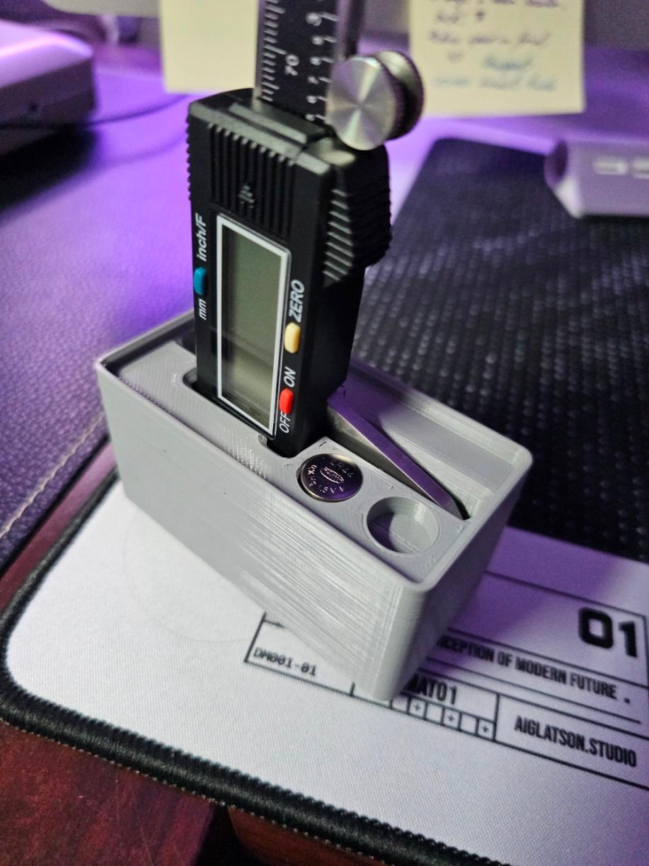 Gridfinity Neiko Caliper Holder - Fits the LR44 battery perfectly as long as you have the orientation correct. - 3d model