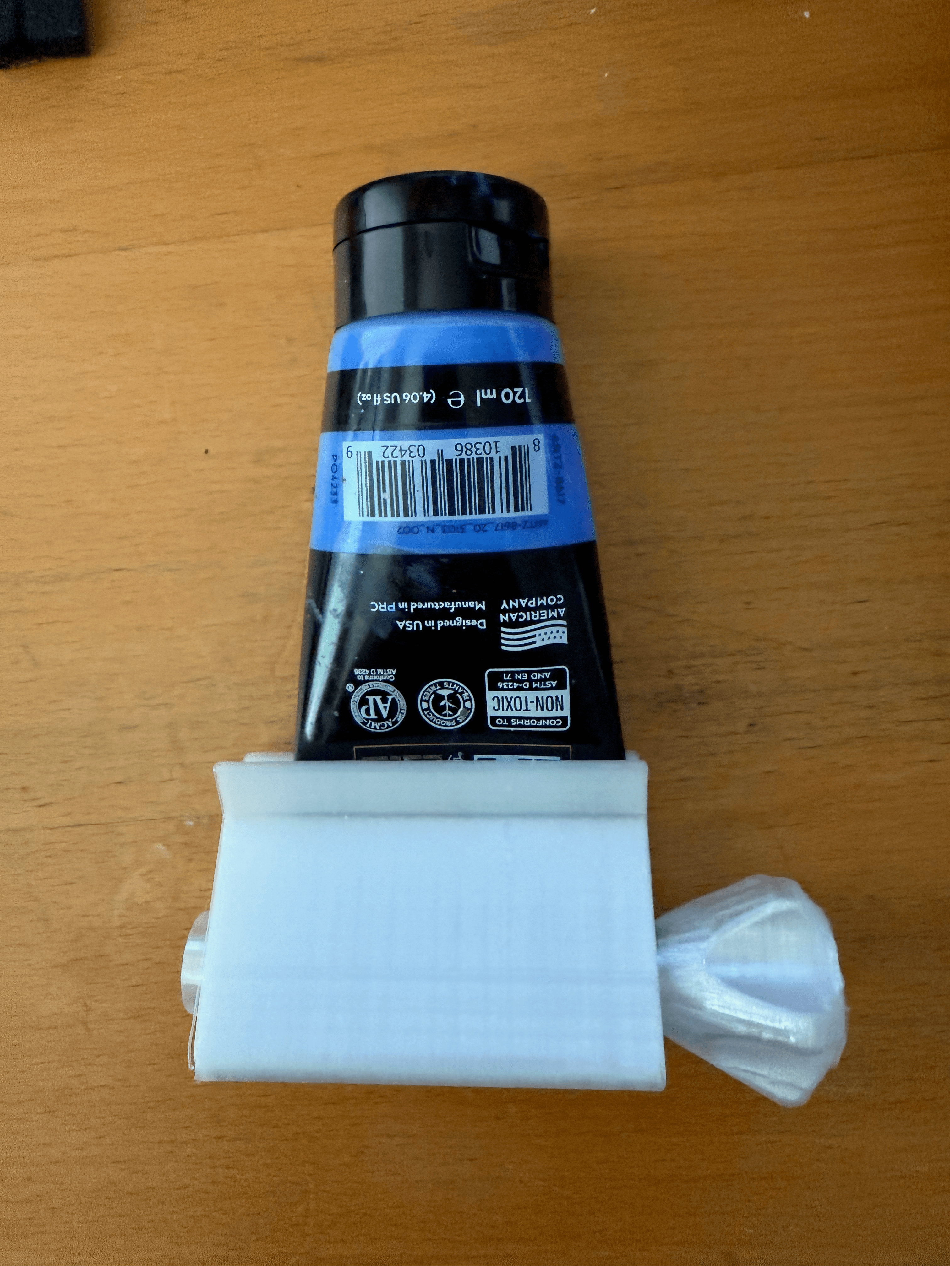Nice: simple and effective. Perfect for squeezing paint tubes, which are slightly larger than toothpaste, used it many times since I printed it. Thanks for sharing!