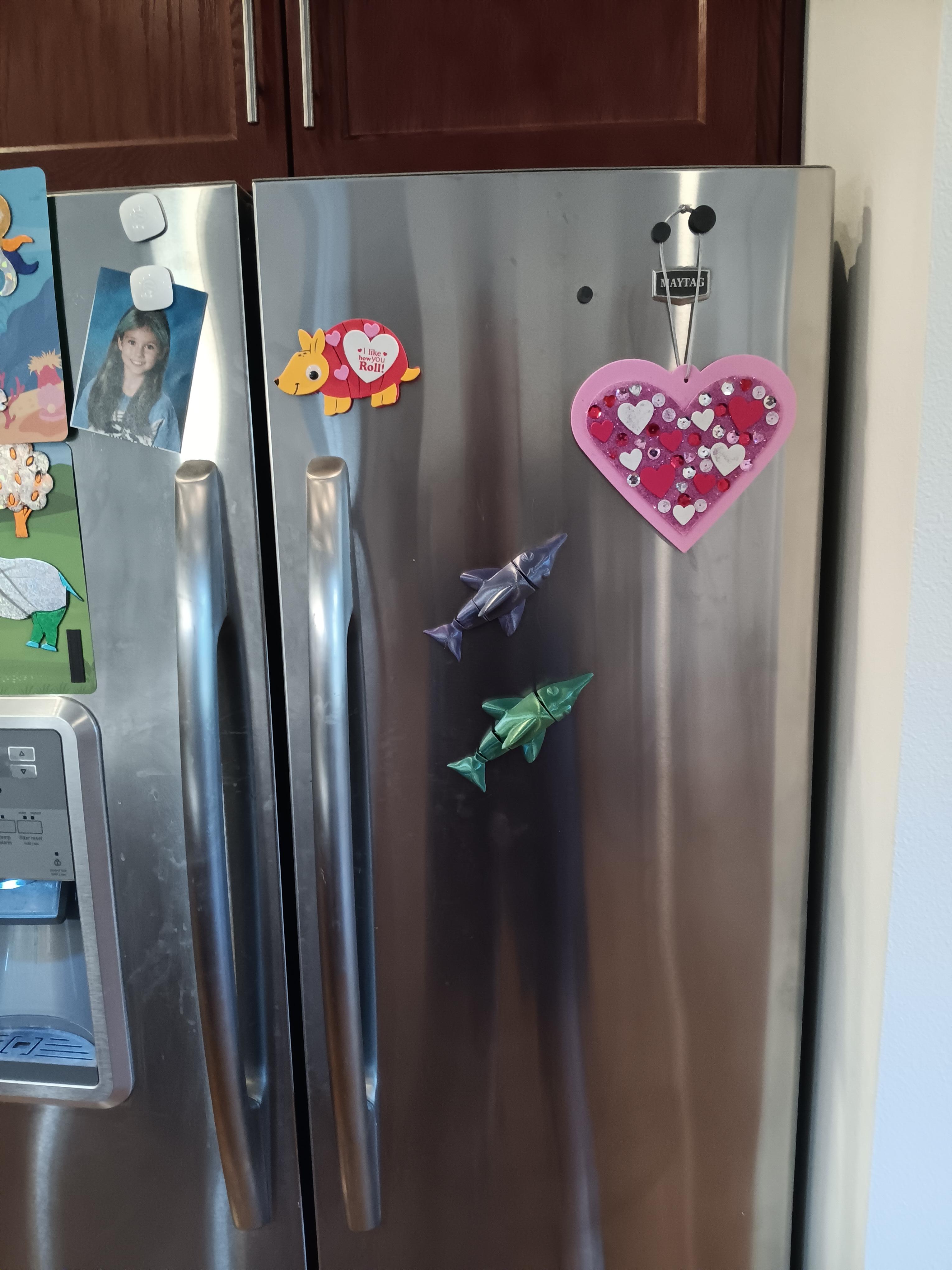 I remixed my dolphin and made it so its a refrigerator magnet 