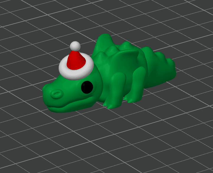Mini Monster #1 wearing a Santa hat!