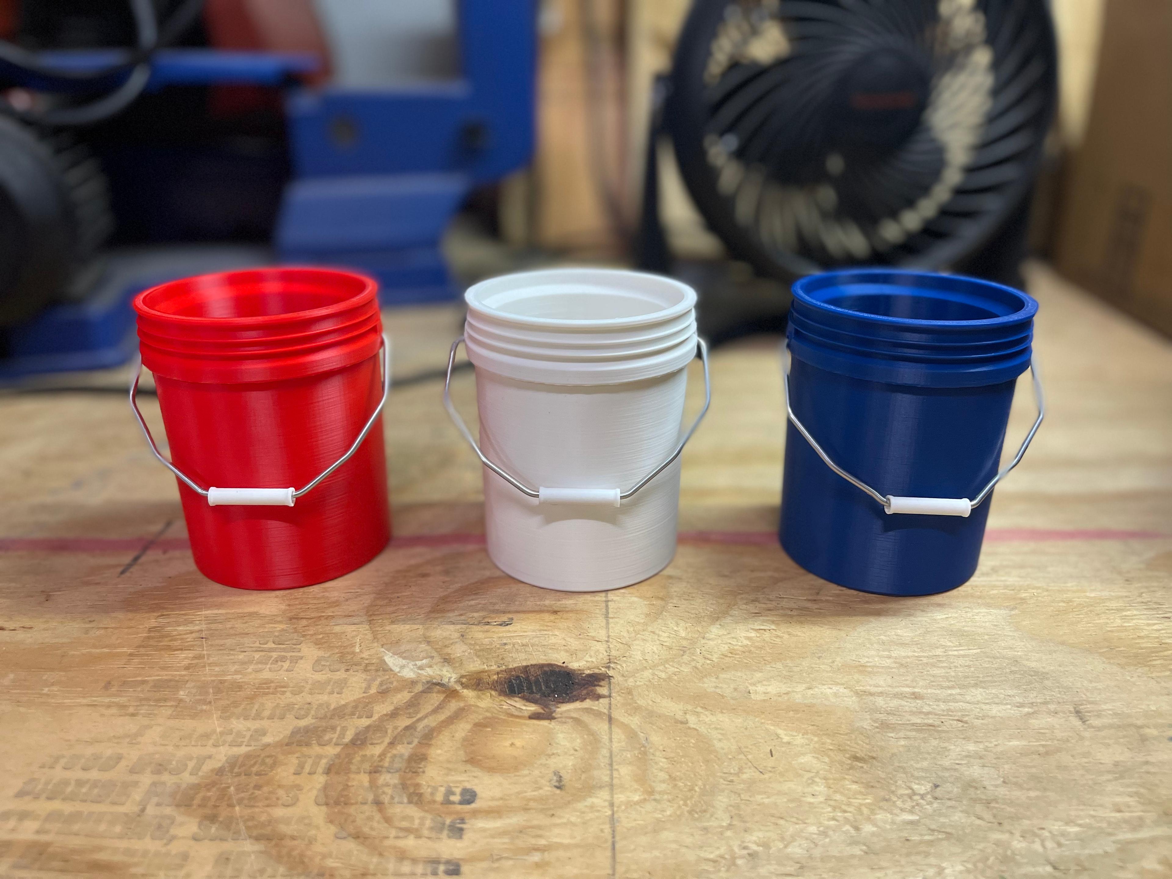 5 Gallon Can Cooler - Awesome model! Made a couple for my groomsmen. Printed on Neptune 3 Pro in OVERTURE red, matte white, and blue PLA. I used welding wire for my handles.  - 3d model