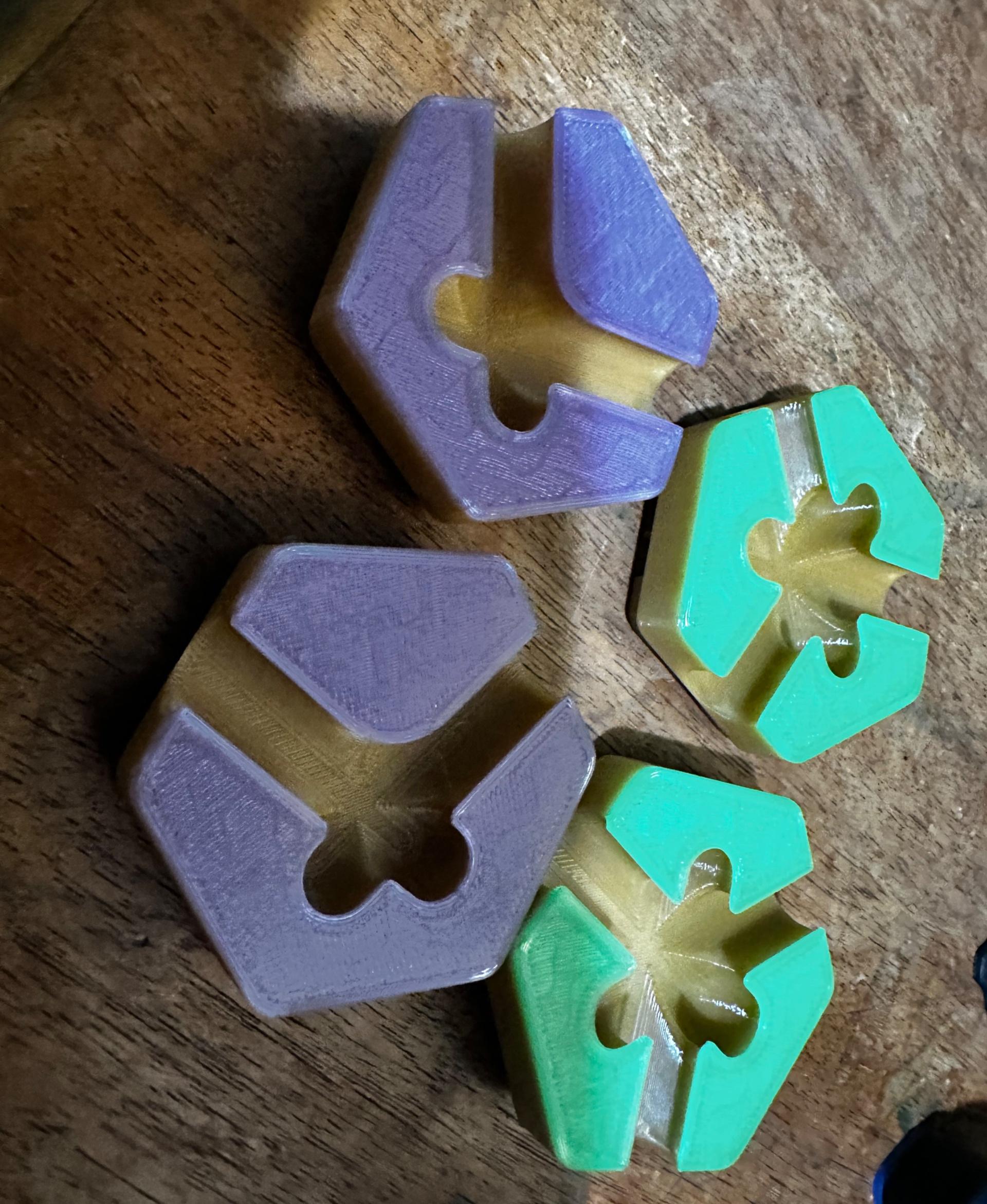 Hextraction Trap Tiles  - Nice print, I used IIIDMax PLA+ Coyote Brown for the bottom, and SUNLU PLA in Transparent Green and Transparent Purple for the tops. - 3d model