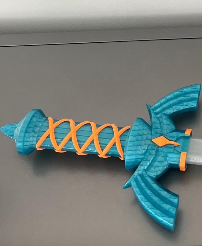 Collapsing Master Sword Multi-Color - Collapsing Master Sword by 3dprintingworld. Printed on the P1P with Greengate petg filament. - 3d model